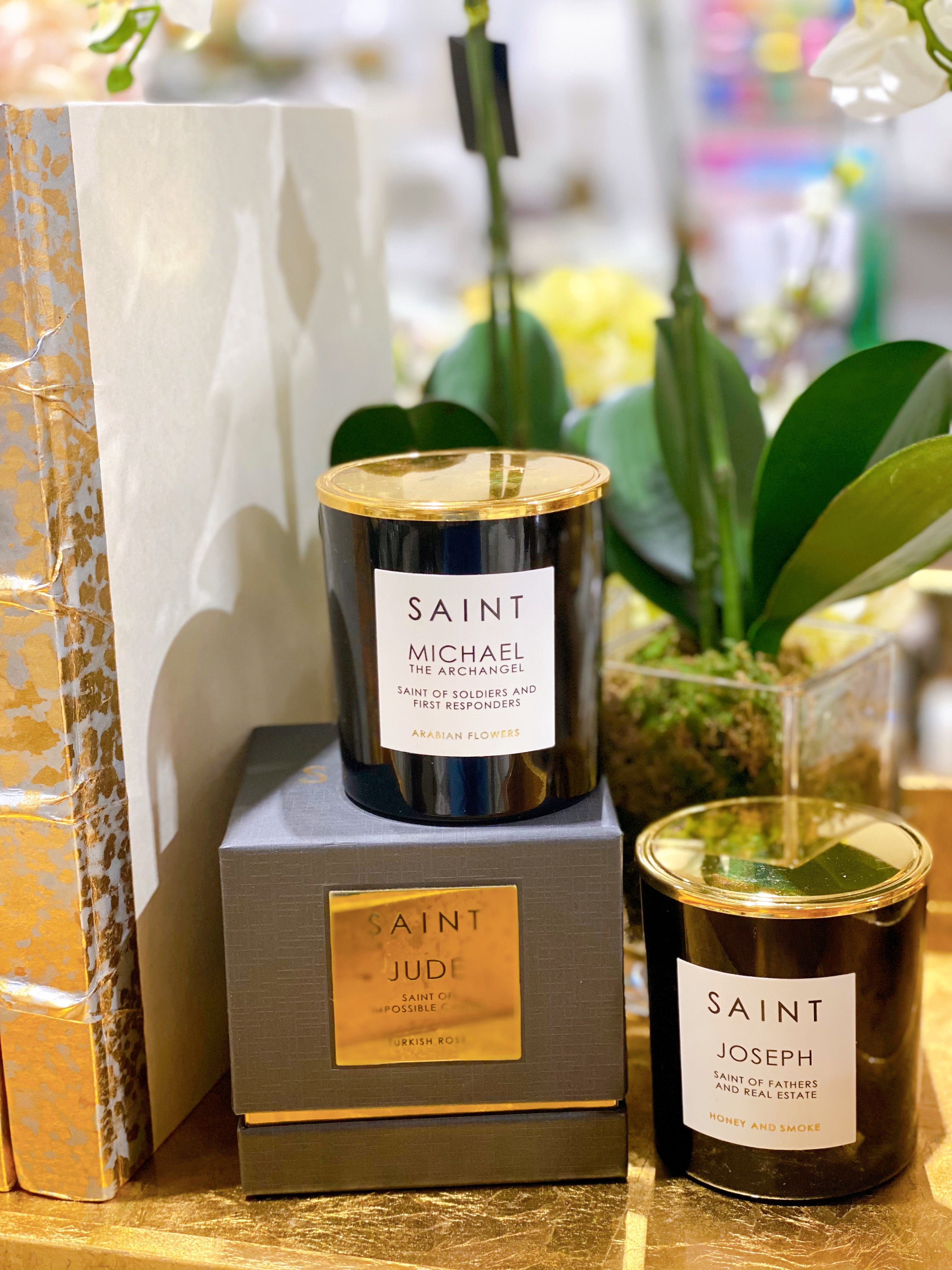 SAINT Candles Caroline & Company